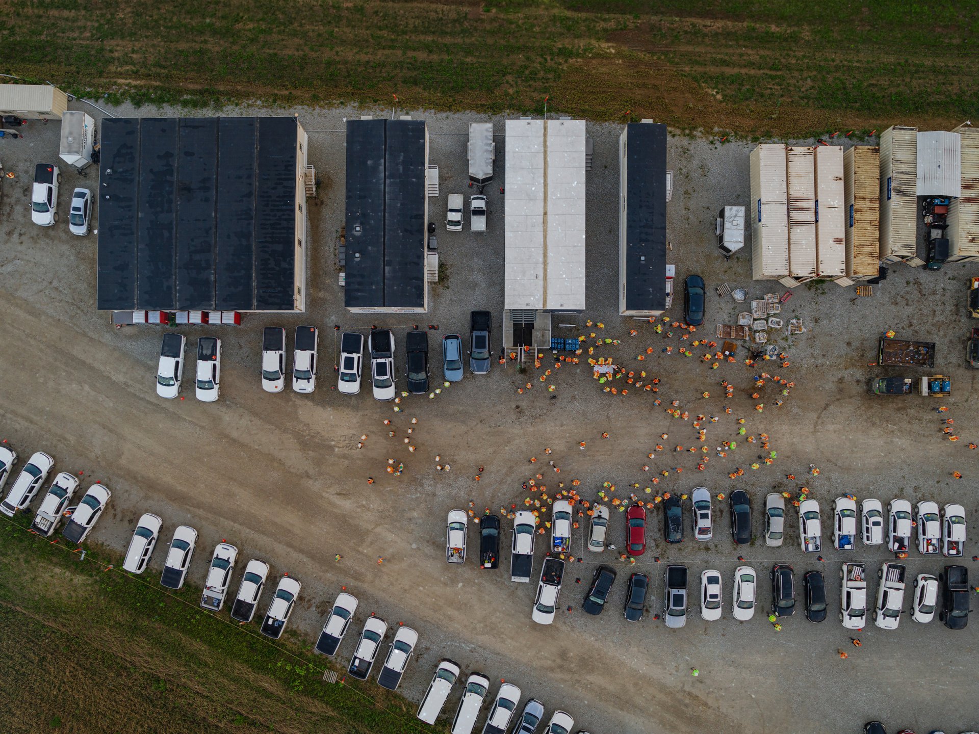 Drone shot facing directly down from high above a project team meeting