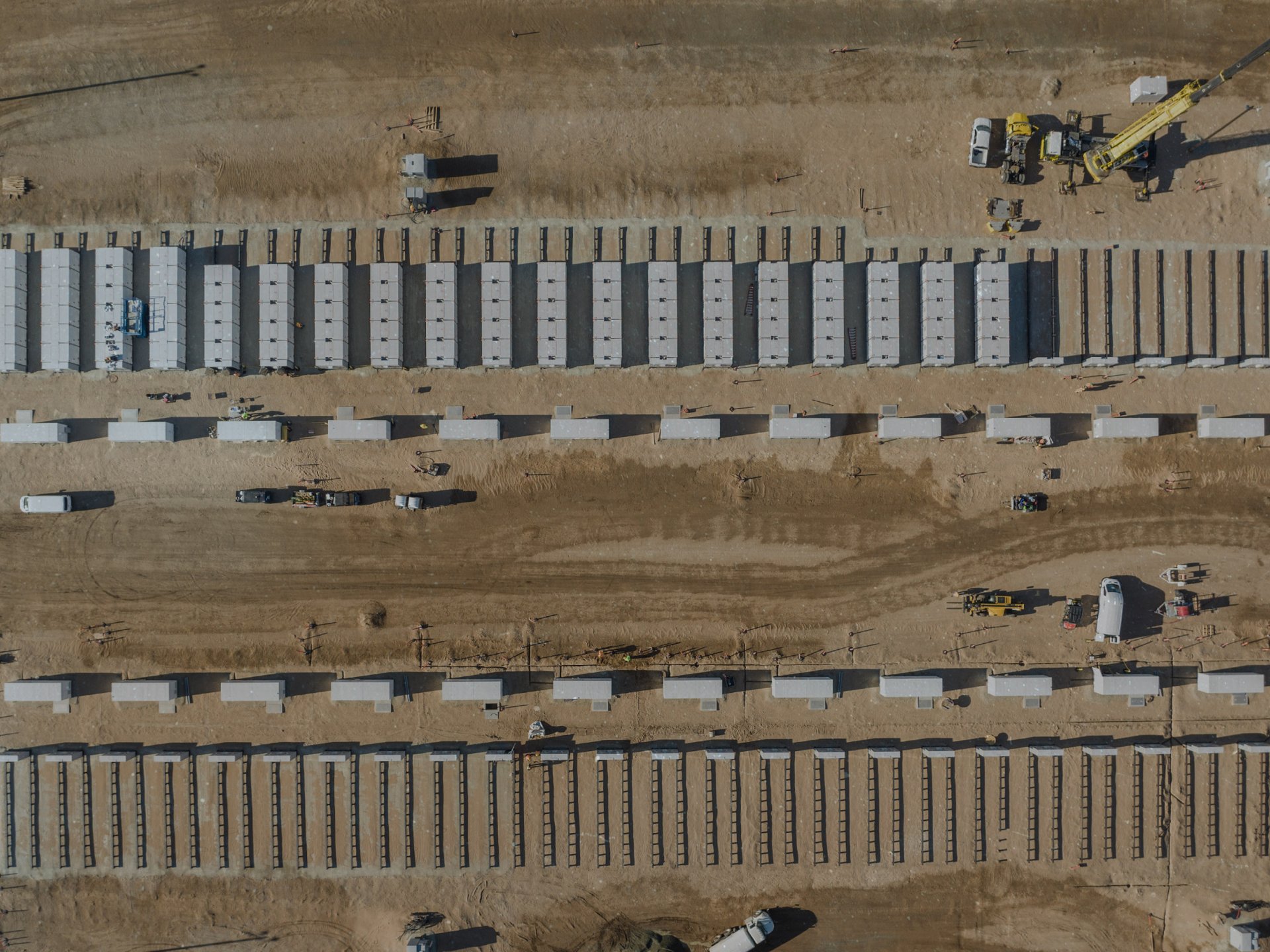 overhead shot looking down on a large electrical storage boxes for a renewable energy project