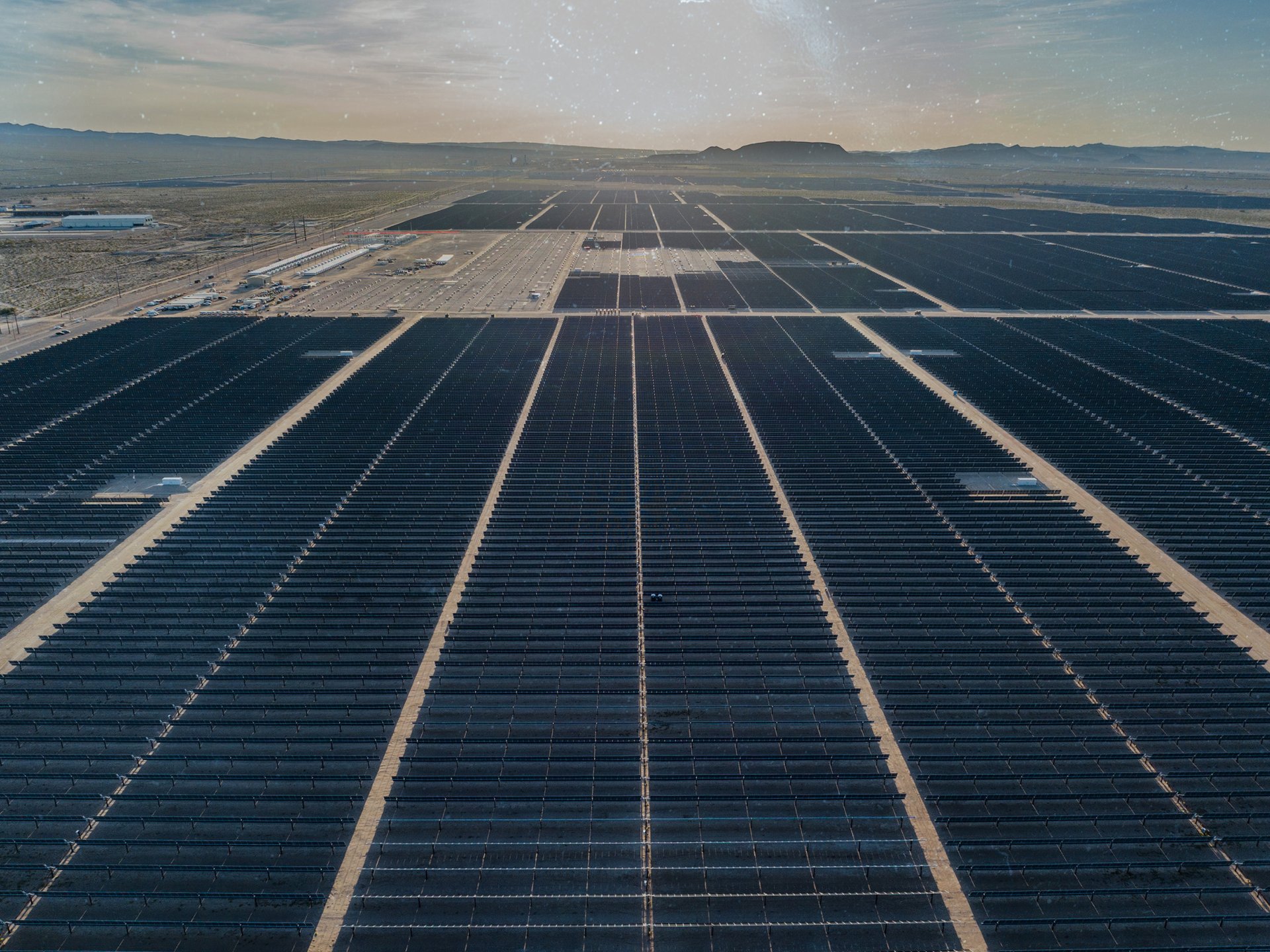 A high altitude overhead view of a solar farm